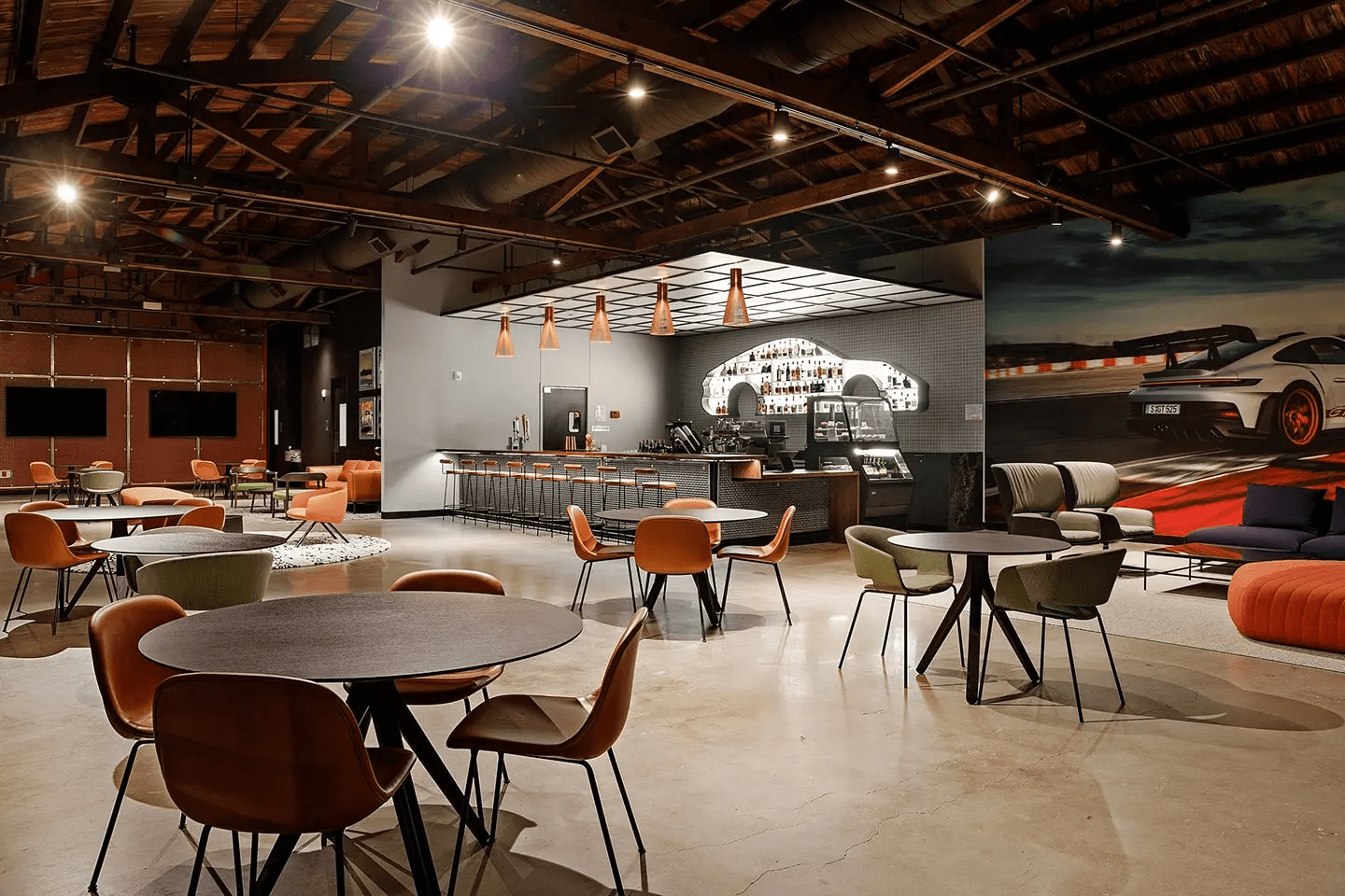 Interior wide-angle of event space with seating and bar