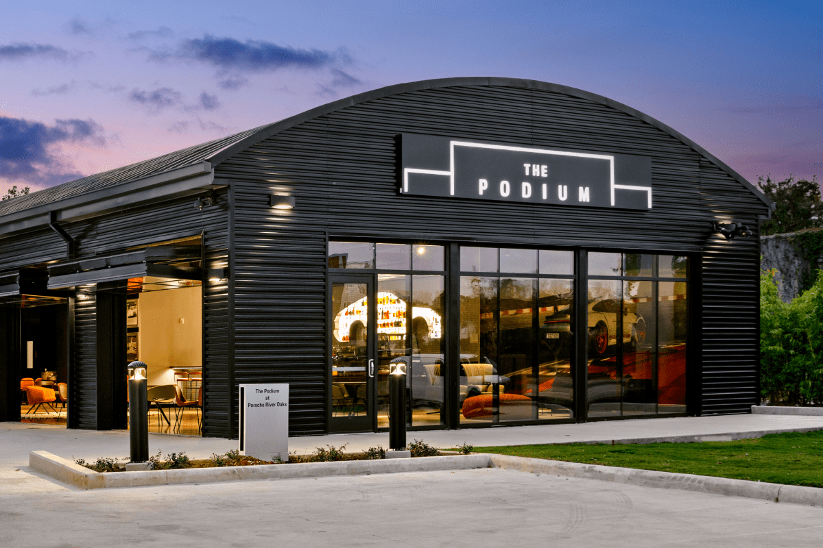 Exterior of event space featuring the podium signage